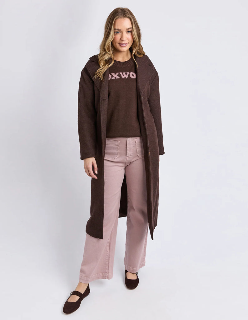 Whistler Coat - Coffee Bean-Foxwood-The Whistler Coat is perfect for cooler days. With a front button opening, a waist tie for a flattering fit, and handy side pockets, it’s equal parts stylish and practical. Crafted from a warm wool-polyester blend, it’s a must-have layer for the season. Front button opening Waist tie Side pockets MAIN: 50% Wool 50% Polyester LINING: 100% Polyester Our model is 176cm and wears Size S-Pash + Evolve