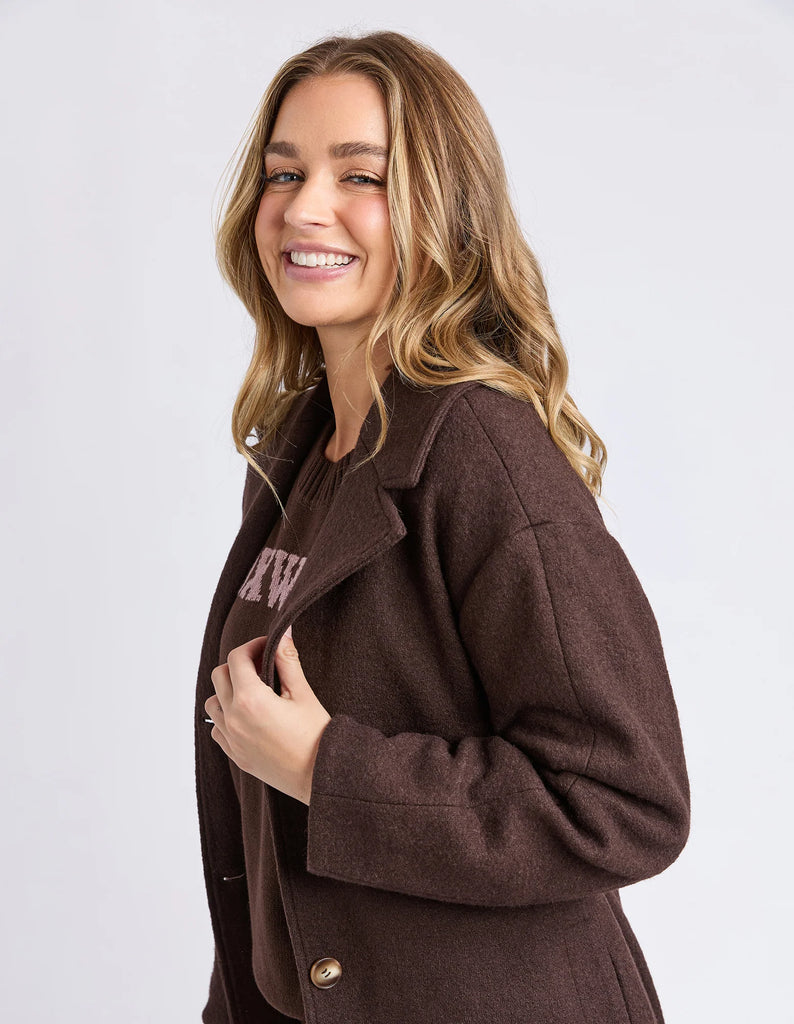 Whistler Coat - Coffee Bean-Foxwood-The Whistler Coat is perfect for cooler days. With a front button opening, a waist tie for a flattering fit, and handy side pockets, it’s equal parts stylish and practical. Crafted from a warm wool-polyester blend, it’s a must-have layer for the season. Front button opening Waist tie Side pockets MAIN: 50% Wool 50% Polyester LINING: 100% Polyester Our model is 176cm and wears Size S-Pash + Evolve