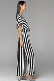 Wonderland Maxi Dress - Black White Stripe-Pash + Evolve-ehold the Wonderland Maxi Dress, a stunning embodiment of timeless elegance. Its relaxed fit gracefully drapes, allowing for comfort without sacrificing sophistication. The front wrap design, combined with kimono-style sleeves, creates an exquisite silhouette, while a detachable self-fabric tie adds a touch of versatility. Both legs feature side splits, imparting an element of allure to this already chic ensemble. Truly an elegant statement piece, the