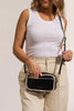 Xanadu crossbody bag - black-Louenhide-The Louenhide Xanadu Crossbody Bag is the ultimate cool girl accessory for summer. Available in a range of playful colours with white contrast trimming, this new camera bag styles is a fun way to embrace the season with a burst of brightness! Allowing you to completely customise your look, the Xanadu features two ways to wear. Simply attach the adjustable vegan leather strap to complement your everyday style or interchange the shorter shoulder strap with light gold cha