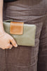 Zuri 2 tone wallet - Olive green with vintage tan-Baleka Leather-Bold design meets everyday functionality with the Zuri 2-Tone Wallet. Featuring striking two-tone detailing, this modern classic adds a pop of personality to your essentials. The press-stud closure opens to reveal a smart interior, including a mini coin purse, 4 note dividers, and 18 card slots — giving you plenty of space to stay organized in style. Chic yet practical, the Zuri Wallet is perfect for those who love a statement accessory that b