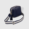Jacinta Metallic Crossbody Bag - Navy-Louenhide-Bags-The Louenhide Jacinta Crossbody Bag is the ultimate cool-girl bag, featuring a complimentary detachable metallic guitar strap. Feel luxe and sporty with our Jacinta over your shoulder. Walk out in style with a fun tassel feature and secure your essentials with its slip and zip pockets. *100% Polyurethane Vegan Leather *Stripe Lining *95-140cm Webbing Guitar Strap *113-129cm PU Extension Strap *Silver Hardware *W22 x H15 x D7cm-Pash + Evolve