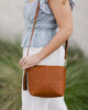 Kasey Stripe Strap Bag - Tan-Louenhide-Bags-The Louenhide Kasey Tan Crossbody Bag with Stripe Strap is a classic women's everyday bag with elevated style. Designed in a soft and slouchy design, this casual crossbody bag is a smaller take on our best-selling Daisy Crossbody Bag. Secure your favourite products in either the zip pocket, the two slip pockets or in the interior compartment for your bigger items such as sunglasses, purse and phone with ease. Complete your relaxed luxe look with the matching strip